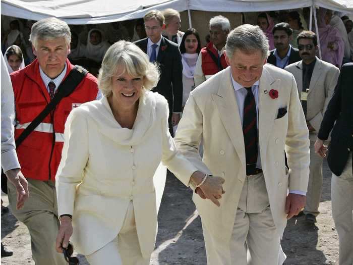 They held hands while doing charity work in Pakistan.