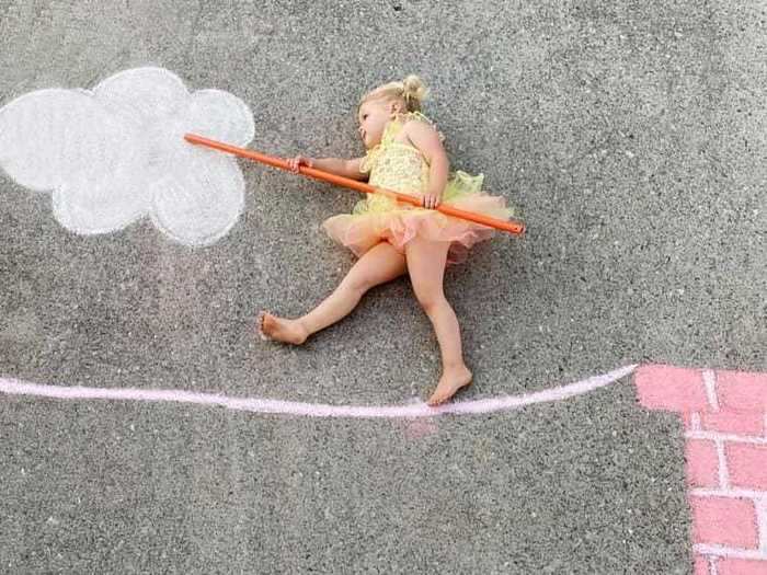 To keep entertained, Tucker and her daughters started playing with chalk on the concrete outside their home.