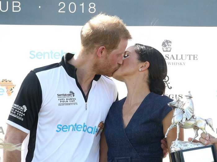 The newlyweds packed on the PDA at a charity polo match that July.