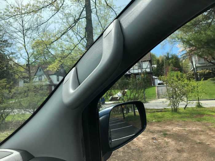 The passenger side gets a grab bar, but the driver has to use the steering wheel to heave themselves in and out of the cab.