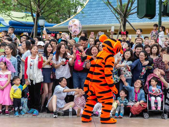 Performers used to greet the audience during the theme park