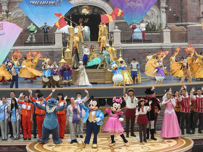 The opening ceremony of the park featured a stage full of dancers and well-known Disney characters.