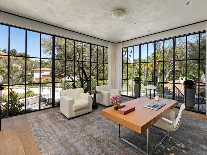 A solarium could function as a light-filled home office.