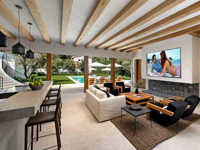 One dining and entertainment area opens up to the outdoors.