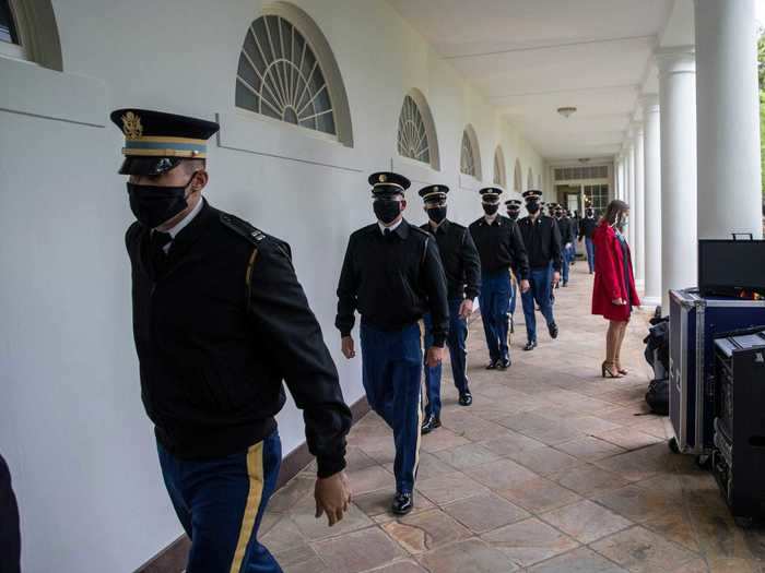 Despite Trump and Pence choosing not to cover their faces in public, visitors of the White House including members of the US Army were seen wearing masks on Monday.