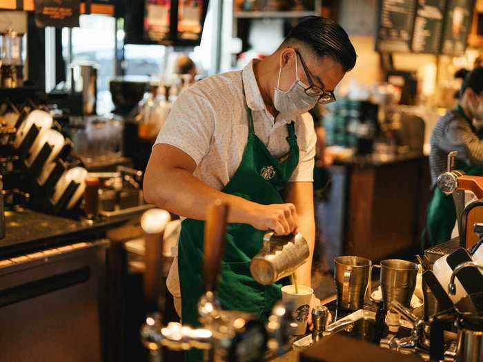 Starbucks is prioritizing employee safety by updating its absentee and pay policies.