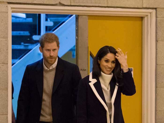 Prince Harry and Meghan Markle both wore navy coats while out in Birmingham, England, in 2018.