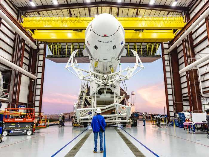 A few days before liftoff, SpaceX will roll the stacked Crew Dragon spaceship and Falcon 9 rocket out of its hangar at Launch Complex 39A ...