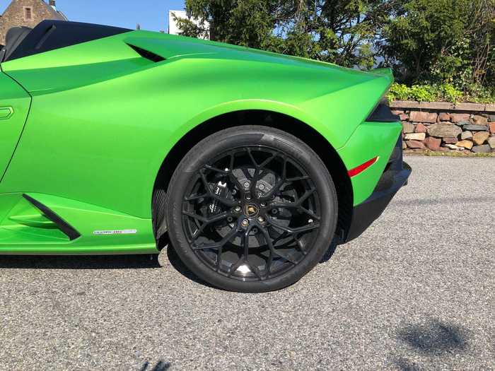 ... with optional black calipers front and rear are $1,400 extra. The 20-inch forged black wheels are a mere $6,600 additional. The Huracán also has rear-wheel-steering.