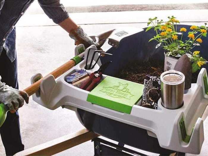 A tray that fits neatly on your wheelbarrow and holds your gardening tools