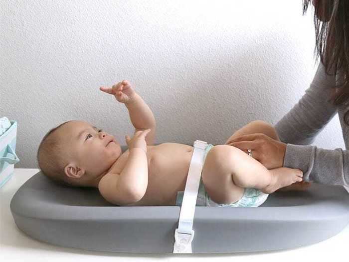 A smart baby changing pad and scale