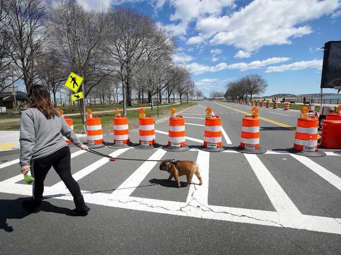 In Boston, at least three roads have been closed down to traffic for pedestrian use, and later this month, the city says it plans to expand additional sidewalks and driving lanes for people to use during the outbreak.