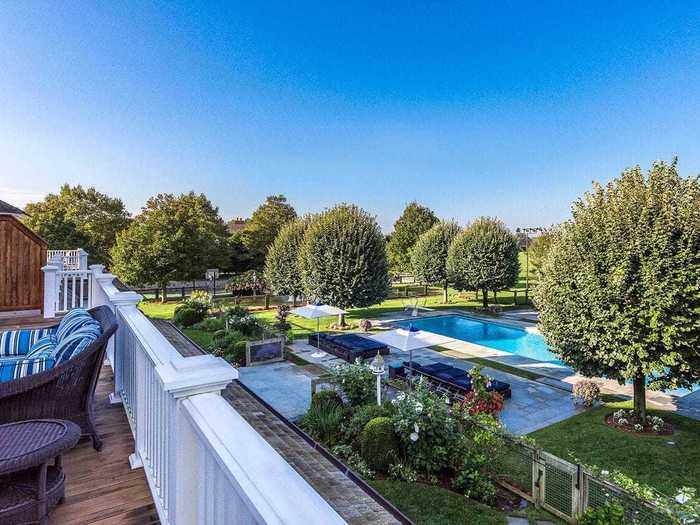 The view over the swimming pool and grounds from the second floor resembles a high-end resort.