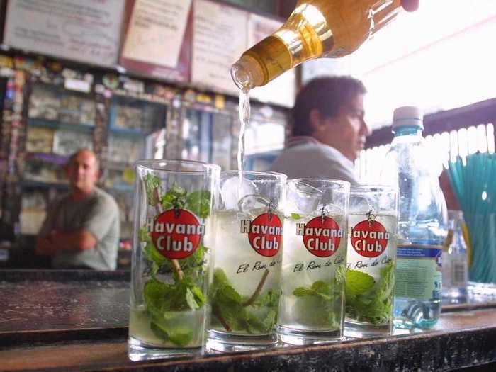 Picture yourself driving a classic car across Havana, Cuba, while you sip a mojito.