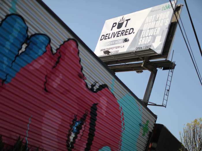 The Pottery Cannabis Dispensary advertises cannabis delivery above the store as part of its marketing efforts.