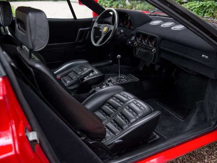 The interior is pretty bare with black leather.