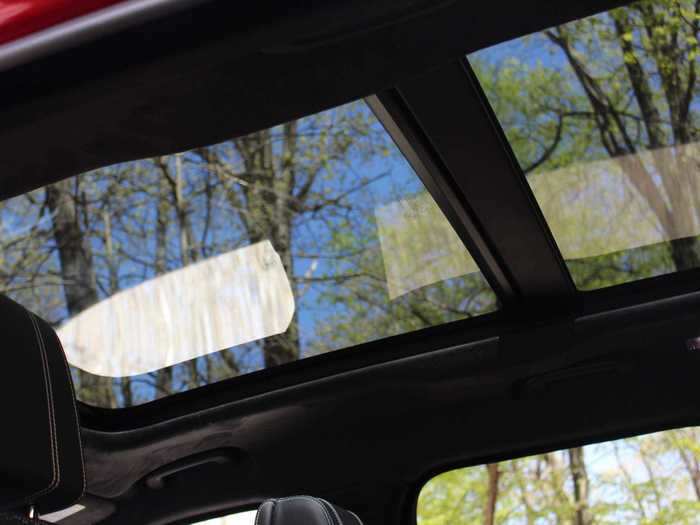 The dual-pane moonroof fills the otherwise dark interior with light.