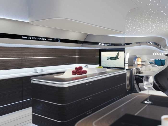 Even the partition that separates the galley and dining room can be opened and the countertop moved between the galley island and dining room table to easily transport meals between the two sections.