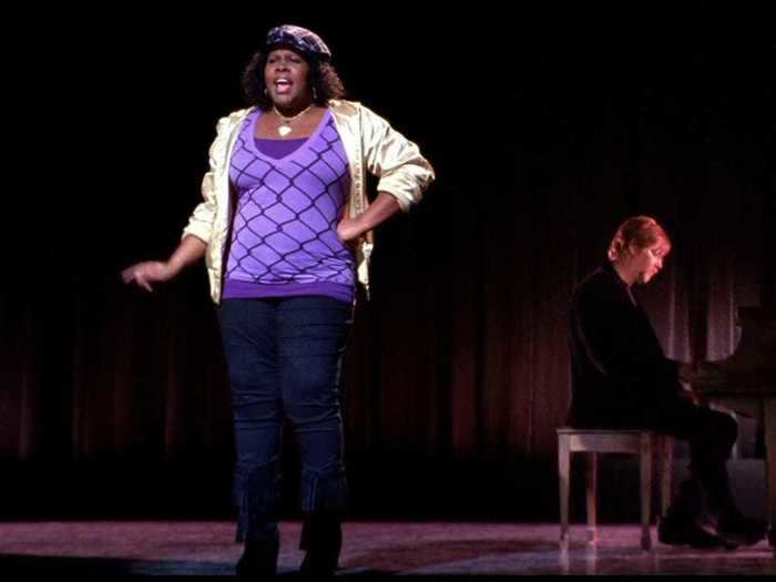 Mercedes Jones first takes the stage in a shiny jacket.