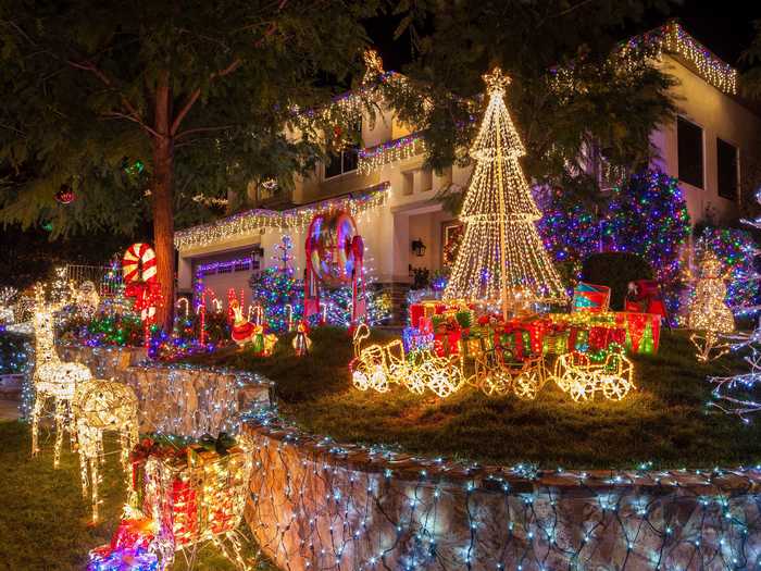 Stringing lights around Christmas trees started in New York City in 1882.