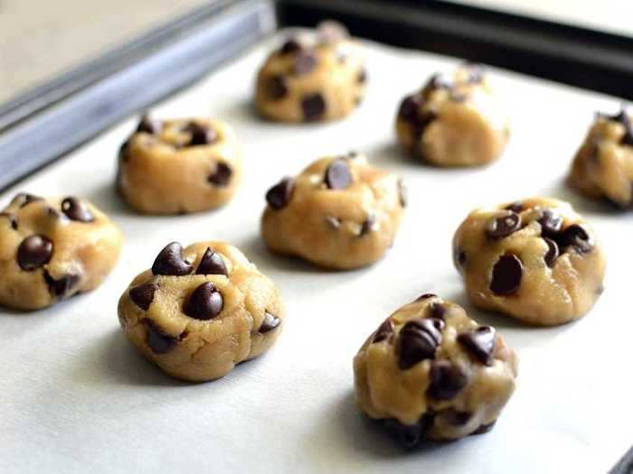 You might burn your cookies if you grease your baking sheet with butter.