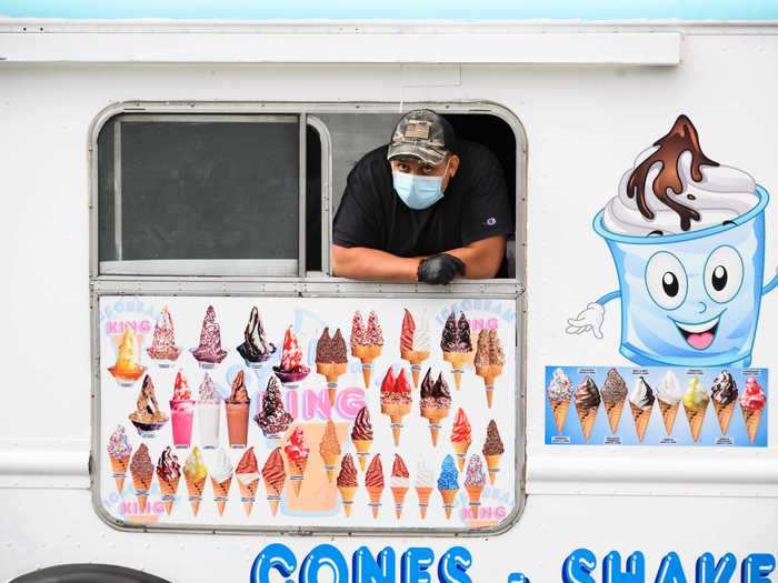 An ice cream truck works in Domino Park in Williamsburg during the coronavirus pandemic as temperatures reached over 80 degrees during the weekend.