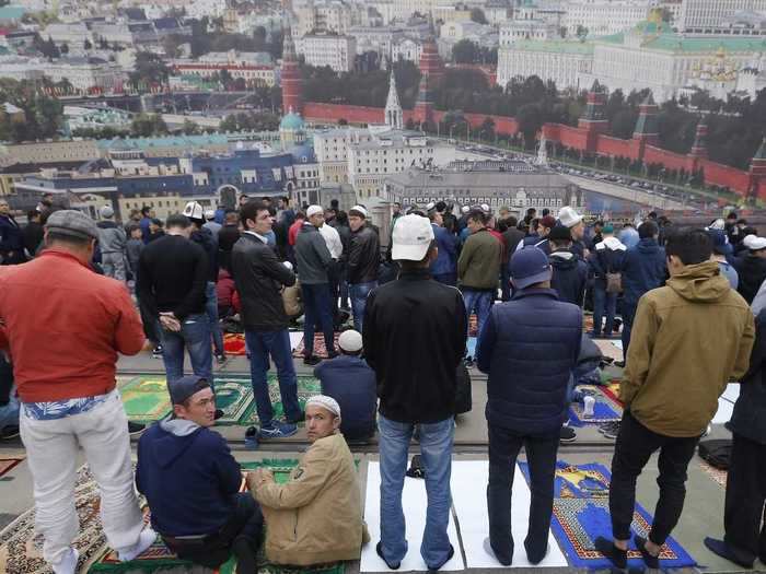 In Moscow, Russia, people gather together for a mass prayer to mark the end of Ramadan.