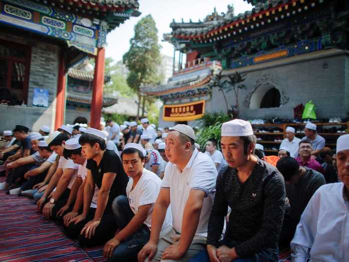 In Beijing, China, Muslim men pray at the historic Niujie Mosque.