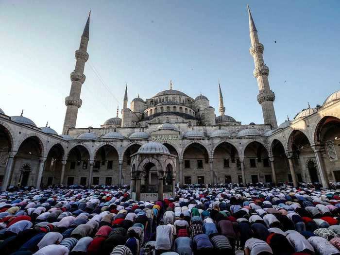 Turkish Muslims pray at the city