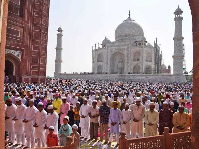 Indian Muslims pray at the Taj Mahal in Agra, India.