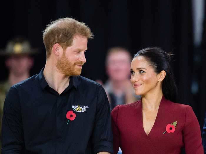 During the same tour, they attended the Invictus Games in Sydney. Just over a year since they first attended the games together in Toronto, this is a much different image, with no PDA — but a knowing look between the couple.