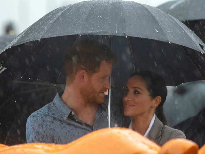 They shared a romantic moment in the rain during their royal tour of Australia on October 16, 2018.