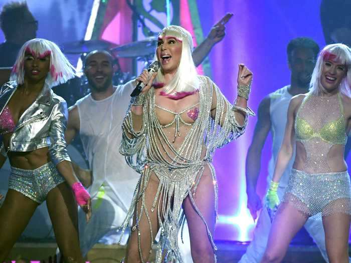 A day after her 71st birthday, Cher took the stage in a daring, silver ensemble at the 2017 Billboard Music Awards.