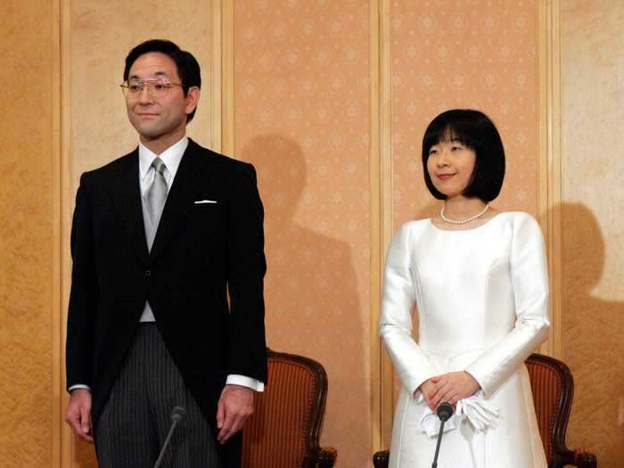 Sayako Kuroda gave up her royal title as Princess Nori of Japan to marry Yoshiki Kuroda in a plain, A-line dress and white gloves.