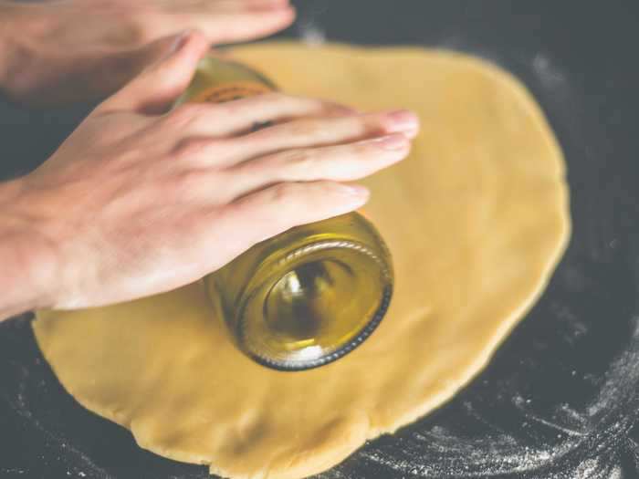 A wine bottle can be a rolling pin in a pinch.