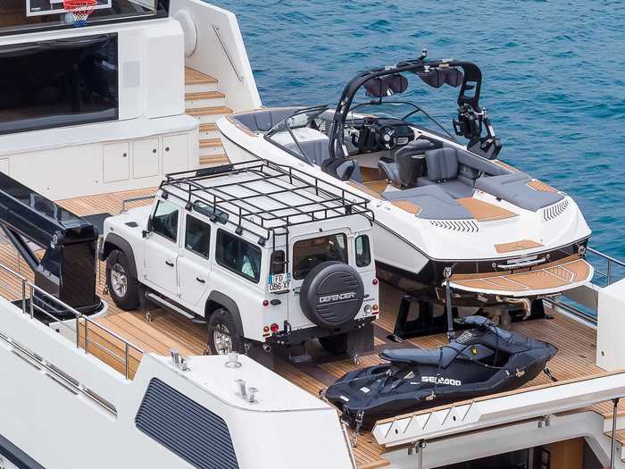 The roughly 89-foot YXT 24 Evolution can carry toys like additional boats, jet skis, and SUVs.