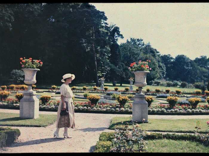 Paris is also home to a number of beautiful gardens and parks. In this photo, a woman walks through the Jardin de Bagatelle in the 1920s.