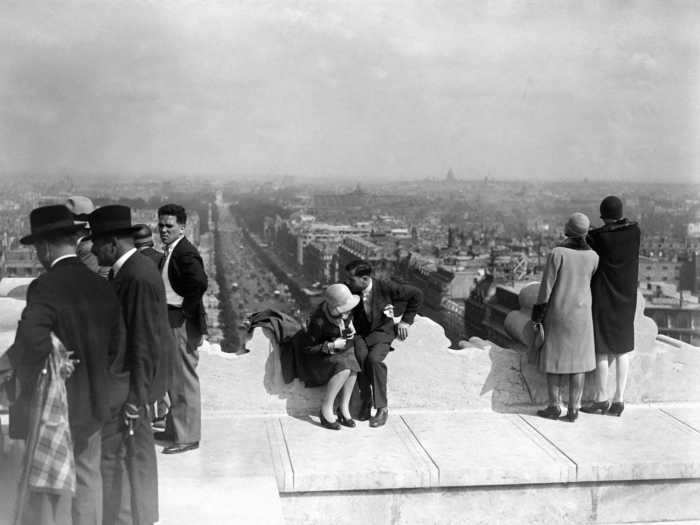 The Arc de Triomphe is another city staple. The monument opened in 1836 to honor those who died during the Revolutionary War. From the top of the arc, visitors can enjoy a panoramic view of Paris, which looks a little different today from how it did here in 1929.