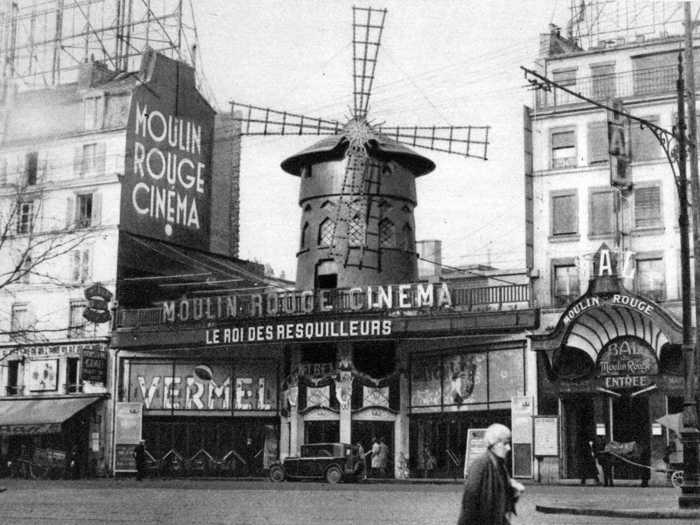 Another iconic establishment in Paris includes The Moulin Rouge, a famous nightclub known for its cabaret dancers and burlesque performances. Here, the building is pictured in 1931.