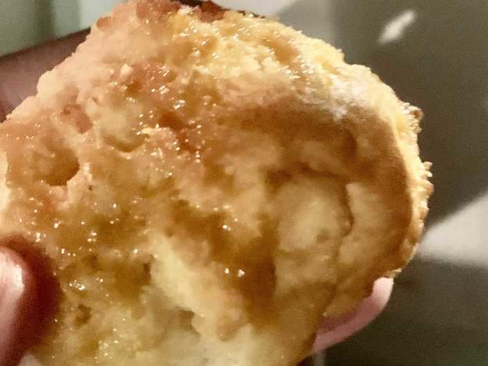 The biscuit came with a honey glaze already drizzled on top.