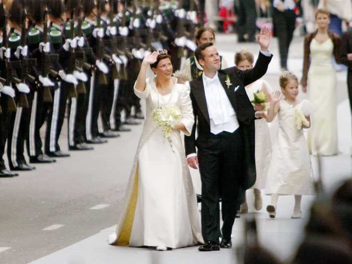 Princess Martha Louise of Norway and writer Ari Behn waved to onlookers at their 2002 wedding.