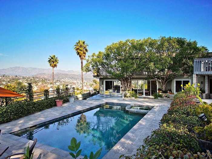 Los Angeles is at your feet in this fully equipped, modern pool house in a private residential compound.