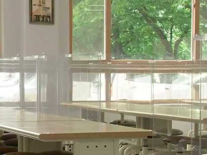 This school in Daegu also put in transparent partitions between seats in its canteen.