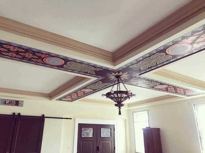 In the second-floor foyer, before you enter the living space, you can see a mural on the ceiling.