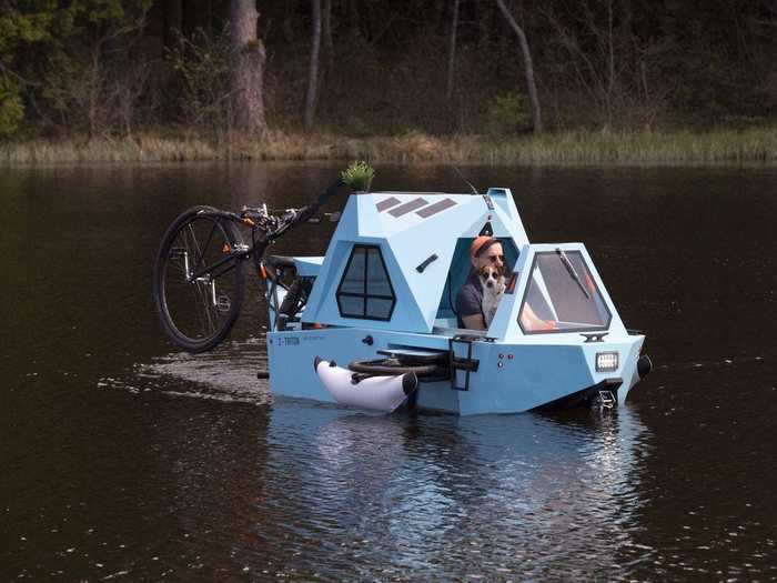 One side is the front of a tricycle, with a bike seat for the driver. The back then becomes the front as it converts into a boat.