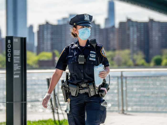 Police officers roamed the park to enforce social distancing guidelines and pass out masks.