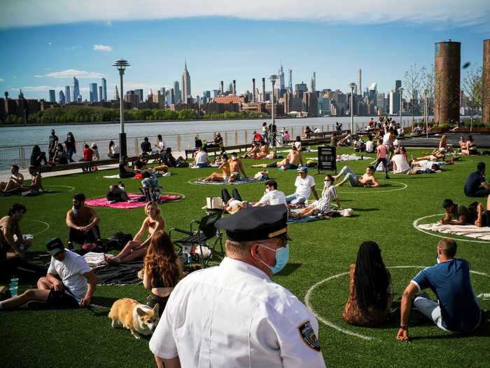 The circles act like human parking spots, allowing people to enjoy the sunshine and the park