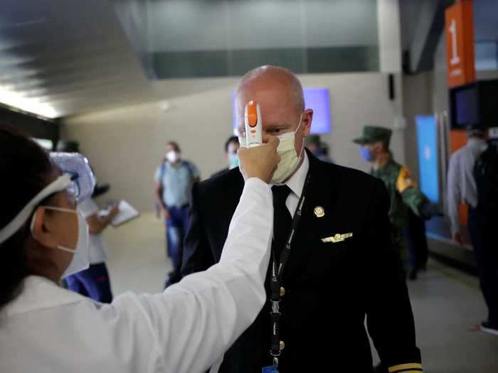 Many airports around the world are also administering temperature checks via electronic thermometers for both passengers and crew members.