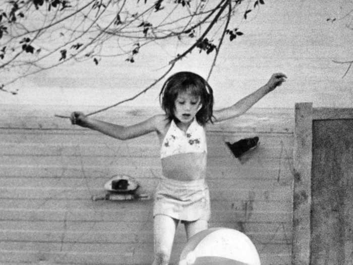 In 1975, two children played on an abandoned mattress in the warm Memorial Day weather.