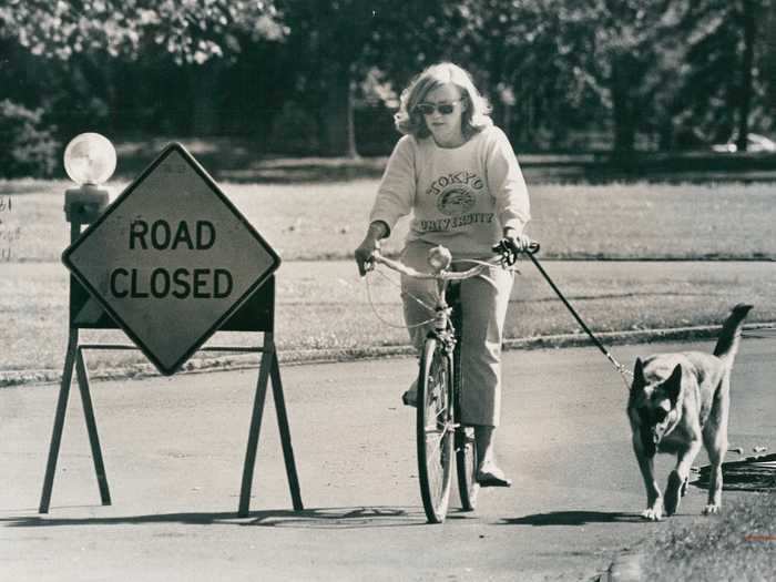 In 1971, a woman enjoyed her Memorial Day weekend with a bike ride, as Denver closed down roads near parks so people could enjoy their day.